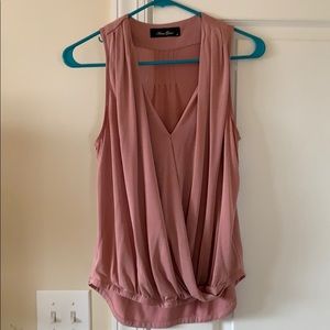 Pink sleeveless blouse